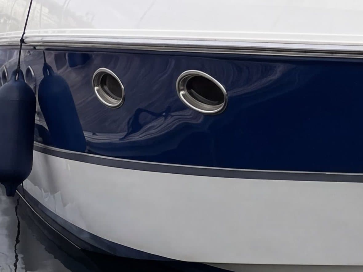 Blue hull side with portholes, restored and glossy